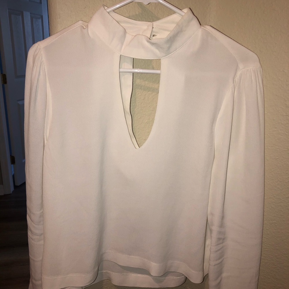 Cream top with open front